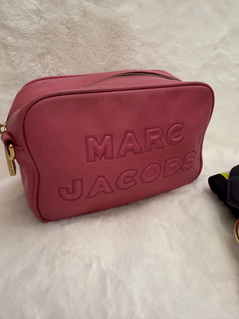 Authentic Marc Jacobs Leather Flash Pink Embossed Crossbody Bag (Category: Luxury Bags & Wallets) located in Paranaque City. Submitted by authentic_mj (Listing ID 1371538614, Image 2). Description: Authentic Marc Jacobs Leather Flash Pink Embossed Crossbody Bag Preloved Authentic from Japan With 2 original straps Issue: sign of use.