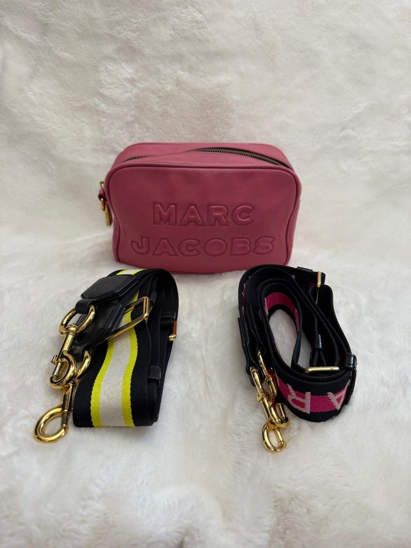 Authentic Marc Jacobs Leather Flash Pink Embossed Crossbody Bag (Category: Luxury Bags & Wallets) located in Paranaque City. Submitted by authentic_mj (Listing ID 1371538614, Image 1). Description: Authentic Marc Jacobs Leather Flash Pink Embossed Crossbody Bag Preloved Authentic from Japan With 2 original straps Issue: sign of use.