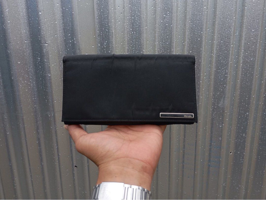 Authentic Prada Long wallet Bifold (Category: Luxury Bags & Wallets) located in Manila. Submitted by kerikeridulce (Listing ID 1371398769, Image 1). Description: Authentic Prada Rfs: Meron ng iba Nakakapogi kahit walang pera Prada celine chanel fendi Balenciaga.