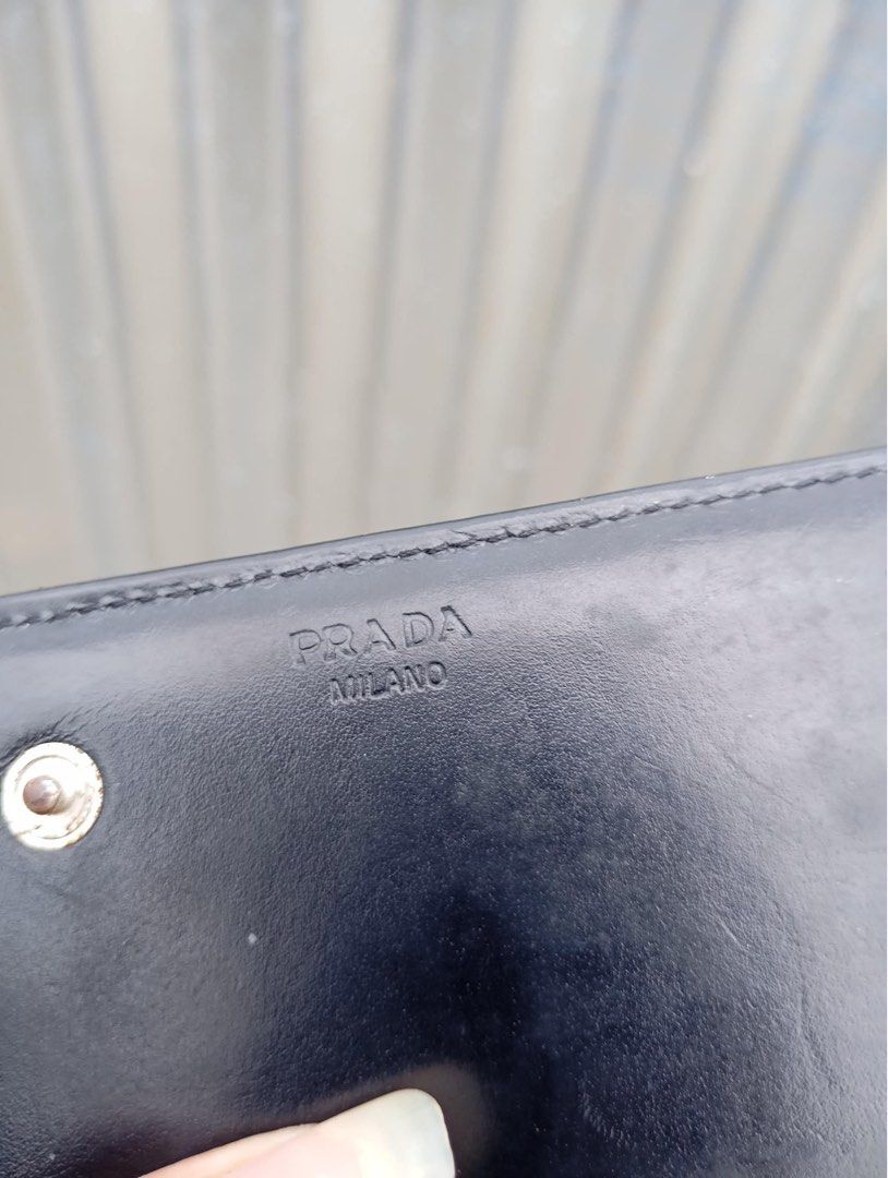 Authentic Prada Long wallet Bifold (Category: Luxury Bags & Wallets) located in Manila. Submitted by kerikeridulce (Listing ID 1371398769, Image 3). Description: Authentic Prada Rfs: Meron ng iba Nakakapogi kahit walang pera Prada celine chanel fendi Balenciaga.