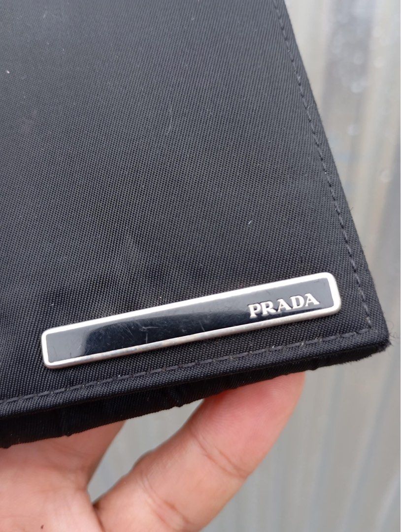 Authentic Prada Long wallet Bifold (Category: Luxury Bags & Wallets) located in Manila. Submitted by kerikeridulce (Listing ID 1371398769, Image 2). Description: Authentic Prada Rfs: Meron ng iba Nakakapogi kahit walang pera Prada celine chanel fendi Balenciaga.