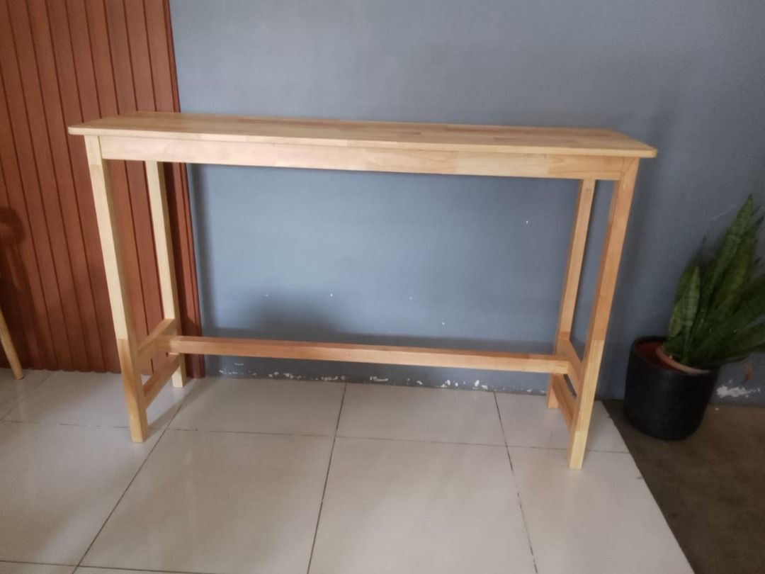Bedside Tables [tb542] (Category: Tables & Sets) located in Quezon City. Submitted by johnericna90745 (Listing ID 1371385570, Image 3). Description: Solid Wood Commercial Bar Dining Table and Chairs Set # Key Features 1. Space-saving design: Ideal for small balconies, apartments and kitchens. 2. Solid wood construction: Durable, high-quality wood for longevity. 3. Integrated dining and kitchen partition: Versatile, multi-functional design. 4. Hig