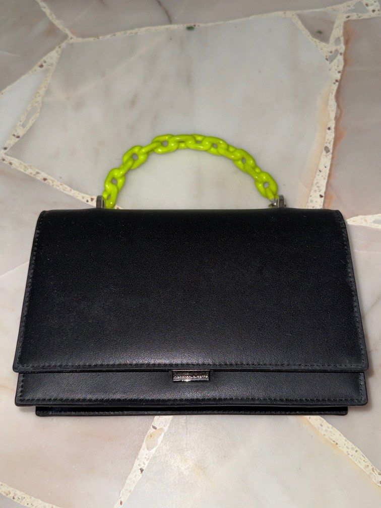 Charles&Keith Neon Strap Bag (Category: Purses & Pouches) located in Singapore. Submitted by xuanlaii (Listing ID 1371471577, Image 1). Description: CTB for more photos.