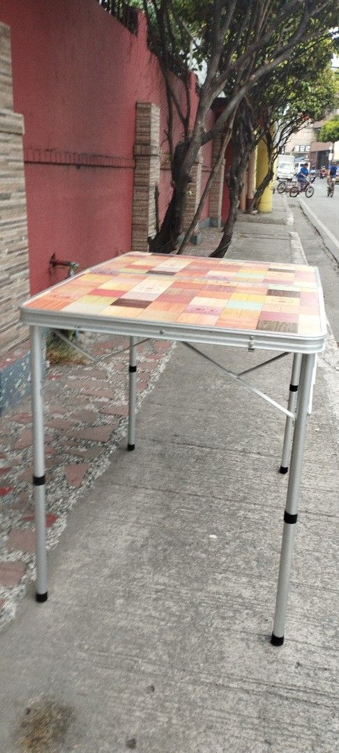 Coleman natural mosaic living Table folding hight & low (Category: Hiking & Camping) located in Malabon City. Submitted by immortalpicker (Listing ID 1371465439, Image 3). Description: Coleman natural mosaic living Table ,folding high & low table Brand= Coleman folding table Model- 90 plus NO to COD NO swapping narmal size H= 27 3/4 inches L= 35 1/2 Inches W= 23 3/4 inches Low table H= 15 3/4 Folded size H= 17 3/4 inches L= 23 3/4 inches W= 2 3/4