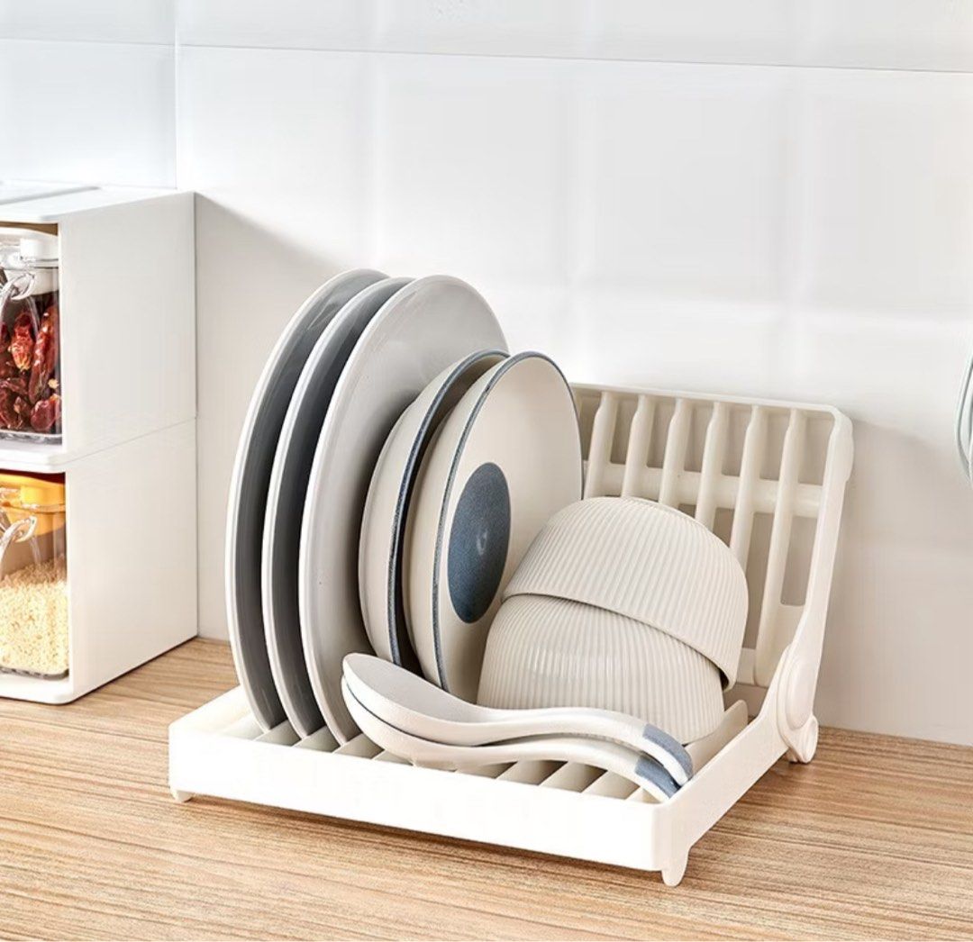 Dish storage/drying rack for sale! (Category: Other Kitchenware & Tableware) located in Cavite. Submitted by bige_mati (Listing ID 1371516489, Image 1). Description: Dish storage/drying rack 📌 Foldable and can be unfolded up to 180 degrees 📌 Each rack can hold up to 12 plates in diameter between 12 to 25 cm and thickness up to 1.5 cm 📌 If rack is unfolded (180 degrees), can be used as a drying shelf for cups, bowls and small kitchen utensils �