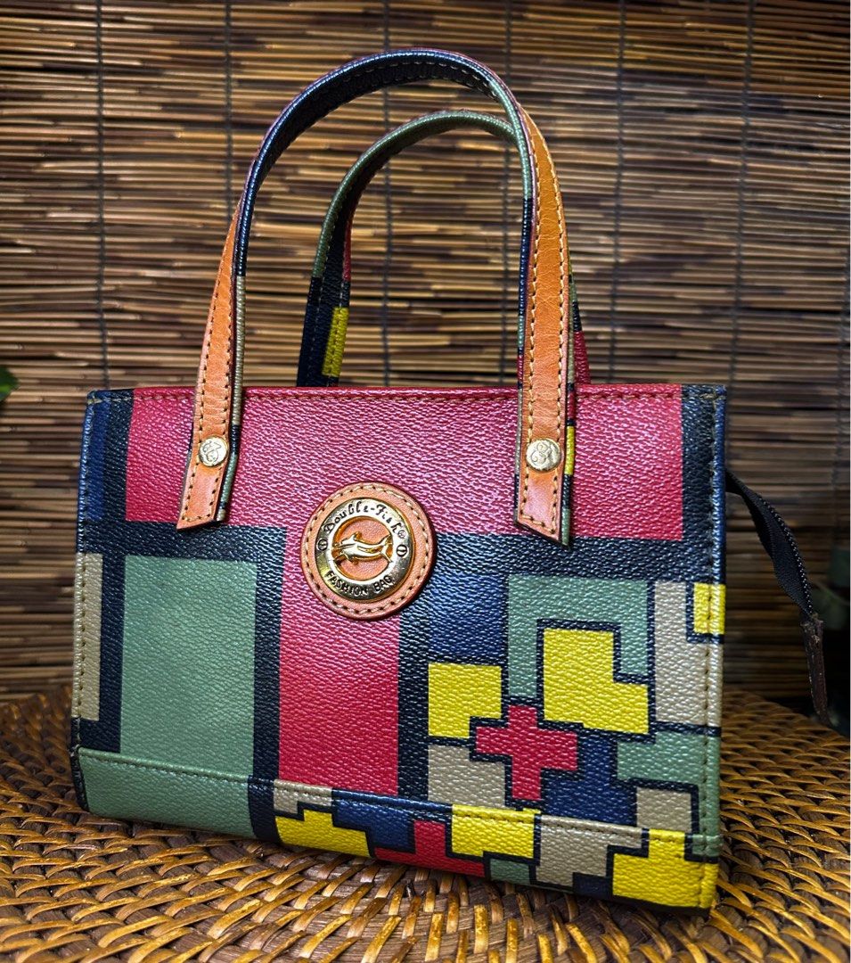 DOUBLE FISH ( MICRO ) MULTICOLOR PVC Vintage Bag (Category: Luxury Bags & Wallets) located in Quezon City. Submitted by whatsinmyclosett (Listing ID 1371469756, Image 1). Description: DOUBLE FISH ( MICRO ) MULTICOLOR PVC Vintage Bag ☑️Made in Japan ☑️Original ☑️Vintage ☑️branded ☑️20 X 14CM ☑️ GOOD CONDITION !! ☑️Manage your Expectations this is Second hand Item/ Vintage Item Hindi Brand New Binibili mo Napaka ganda! Wala akong eexplain minimal s