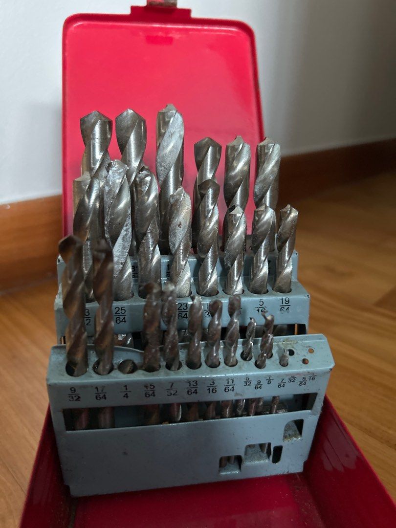 Drill bits (Category: Home Improvement Tools & Accessories) located in Singapore. Submitted by tan.m.esther (Listing ID 1371432385, Image 1). Description: A few worn out and several missing drill bits. Comes in a metal case. Originally $150. .