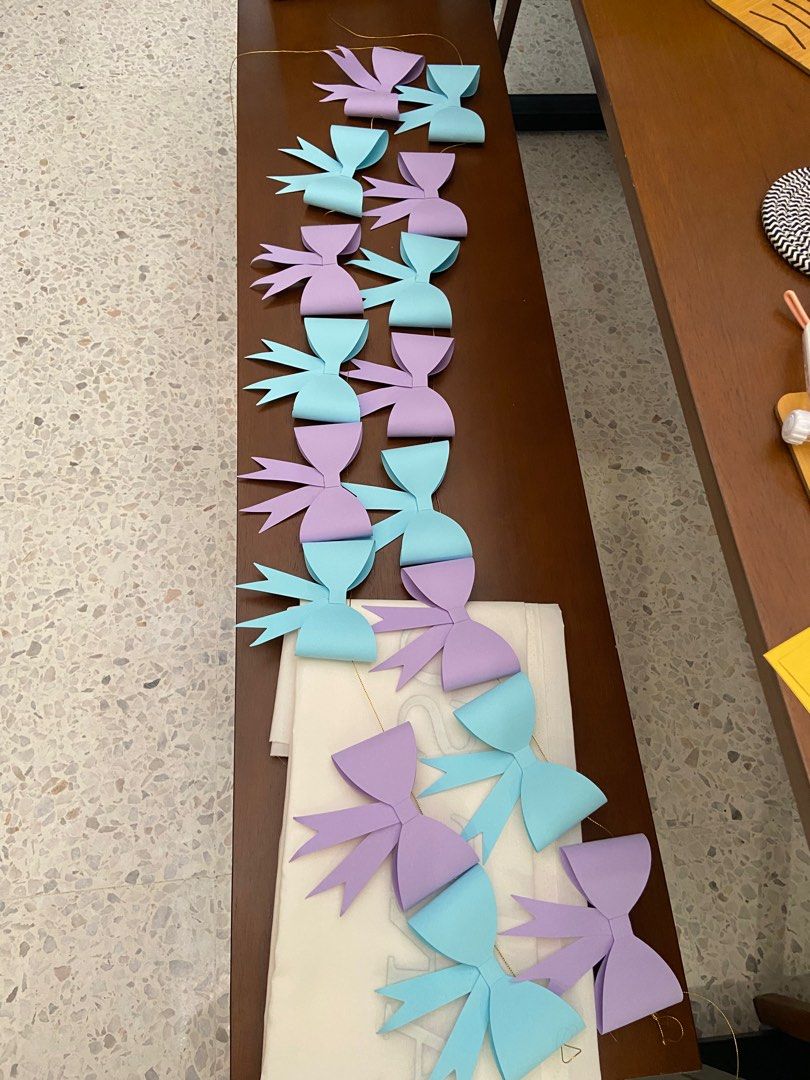 Gender Reveal Baby Shower Cardboard Ribbon Bunting x2 (Category: Announcements) located in Petaling Jaya. Submitted by erniethela34386 (Listing ID 1371449529, Image 1). Description: Ribbon bunting for decoration. One bunting 8 cardboard ribbons. I have 2 buntings.