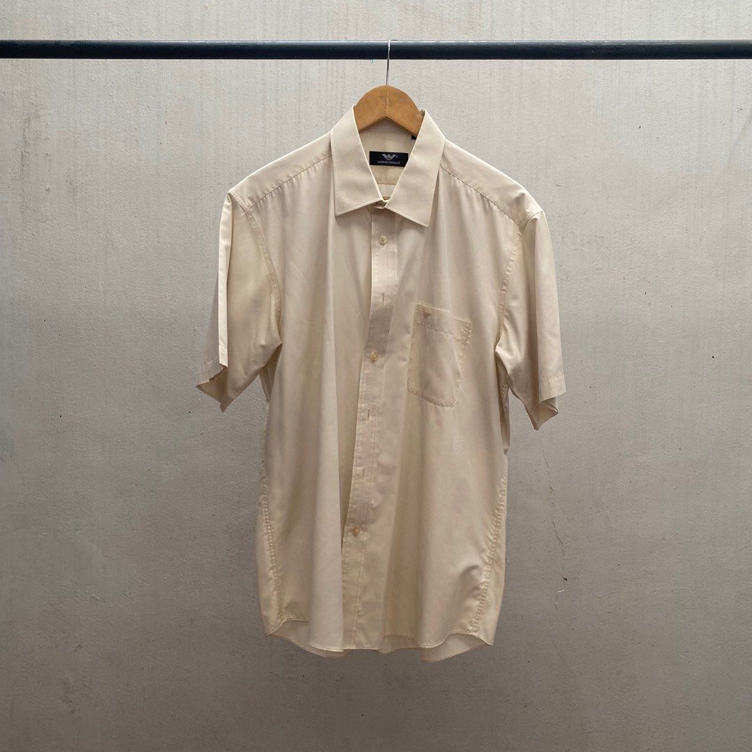 Giorgio Armani Cream Polo (Category: Formal Shirts) located in Quezon City. Submitted by rylledup (Listing ID 1371378709, Image 1). Description: Giorgio Armani Cream Polo Width: 24 Length: 30 Price: 500 .