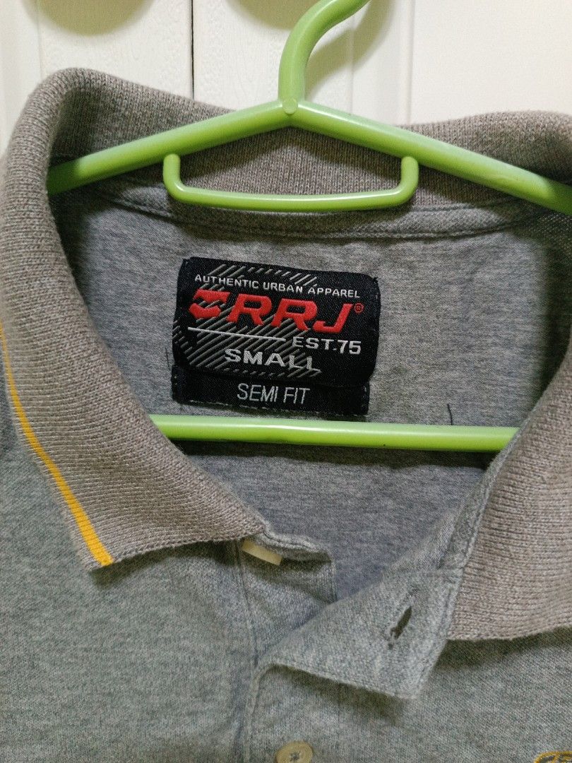 Gray polo shirt RRJ (Category: Shirts) located in Rizal. Submitted by decluttertoreuse (Listing ID 1371482150, Image 2). Description: Size S to M this is preloved, hindi na ginagamit, nakastock nlng and for declutter (negotiable).