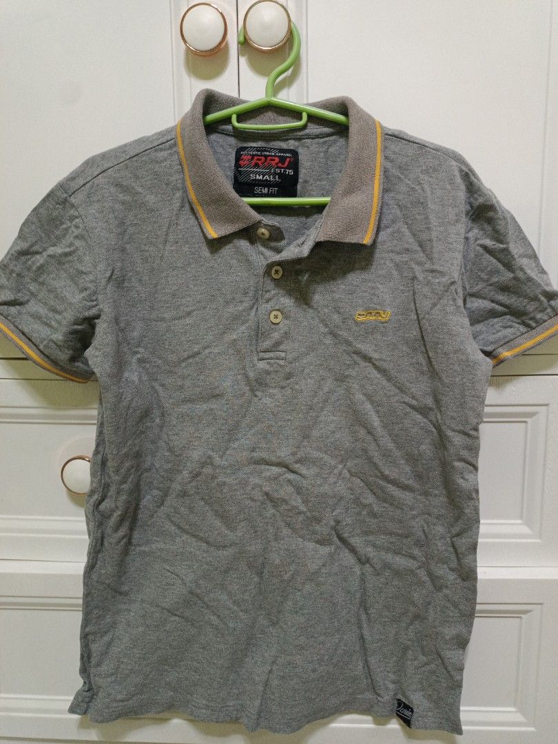 Gray polo shirt RRJ (Category: Shirts) located in Rizal. Submitted by decluttertoreuse (Listing ID 1371482150, Image 1). Description: Size S to M this is preloved, hindi na ginagamit, nakastock nlng and for declutter (negotiable).