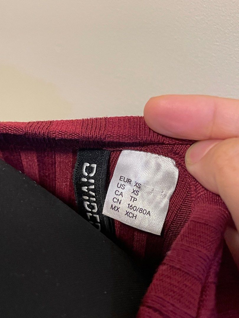 H&M Divided Red Shirt Blouse Work Top (Category: Shirts) located in Cebu City. Submitted by juulibee (Listing ID 1371470336, Image 3). Description: Size XS on tag but can fit S-M frames. Stretchy. Length: 17” Shipping through J&T..