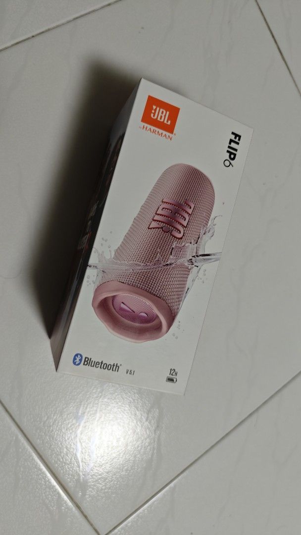 JBL Flip 6 Portable Bluetooth Speaker - Pink (Category: Soundbars, Speakers & Amplifiers) located in Singapore. Submitted by Wilson_Ks (Listing ID 1371493574, Image 2). Description: Hey there! Selling this brand new JBL Flip 6 Bluetooth speaker. It's the latest model, and it's still in its original packaging. This speaker is perfect for taking your music on the go, with its portable design and long battery life. It's also waterproof, so you don't