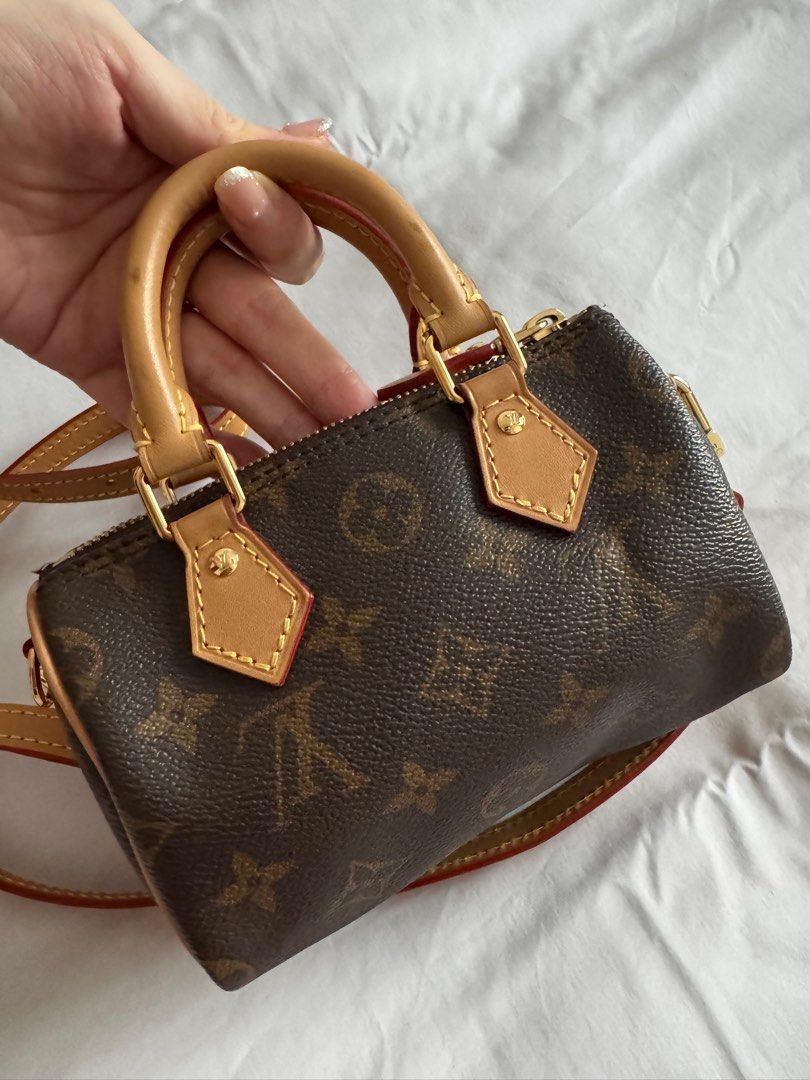 Louis Vuitton Nano Speedy (Category: Bags & Wallets) located in Singapore. Submitted by diamondmind (Listing ID 1371297647, Image 3). Description: Bought at Las Vegas in June 2022. Lightly used and very good condition. Dust bag, receipt are available. Condition details like photos. Original photos, no photoshop. 2nd and 3rd photos are for both sides. Fixed price only, no negotiation thanks. .
