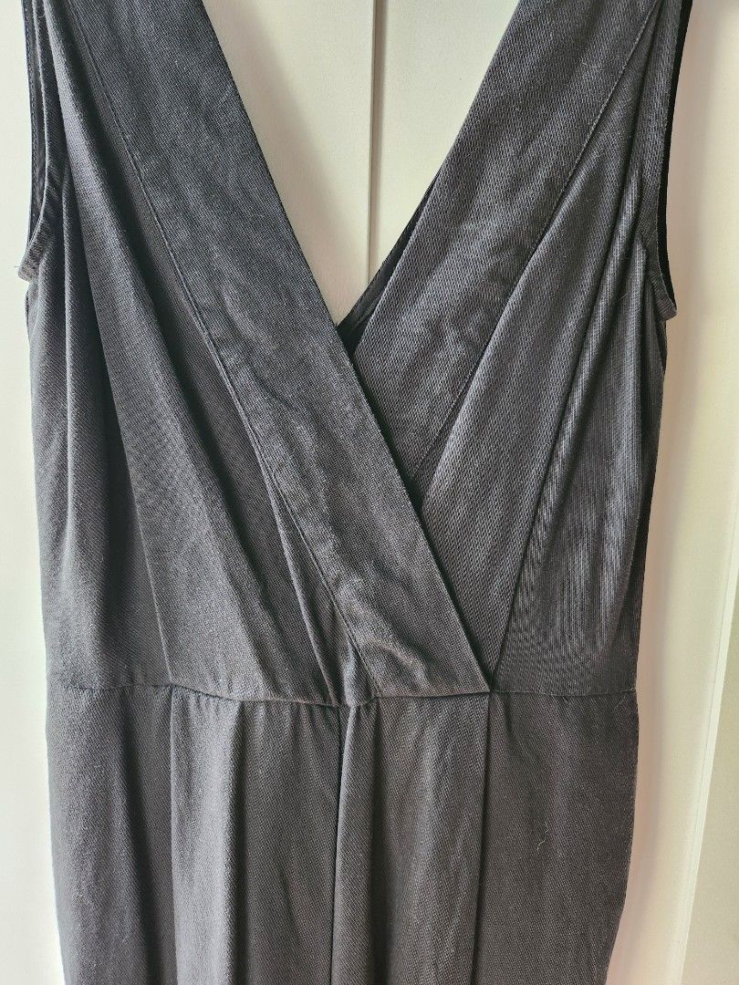 Mango Open Back Jumpsuit (Category: Jumpsuits) located in Quezon City. Submitted by six_half (Listing ID 1371452597, Image 3). Description: Fits XS frames Cup A-B No pockets With Waist Belt Measurements Laid Flat: Bust: 15" Waist: 12.5" Length: 50".