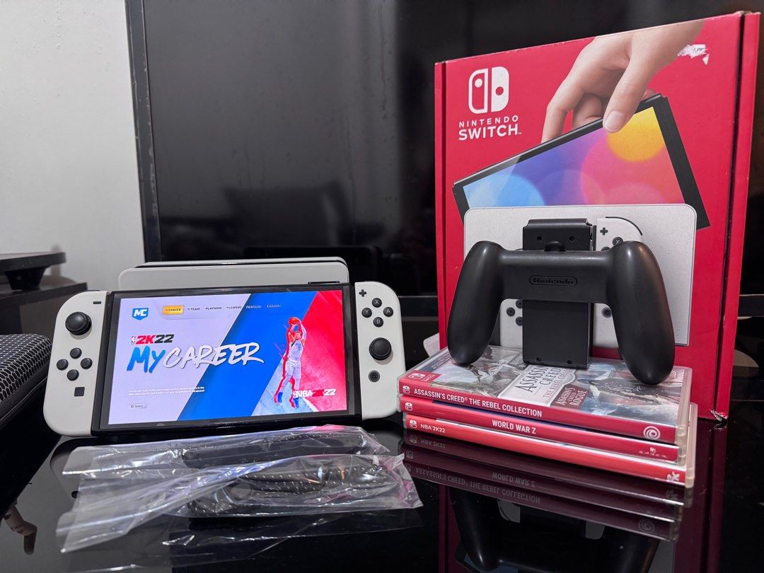 Nintendo Switch OLED white with Free games and micro SD card (Category: Nintendo) located in Manila. Submitted by pinggerzzz (Listing ID 1371373021, Image 1). Description: Nintendo Switch OLED Including 256gb Microsd Games: - World War Z - Assassin’s creed Rebel collection - NBA2k2022 Case RFS: Rarely played.