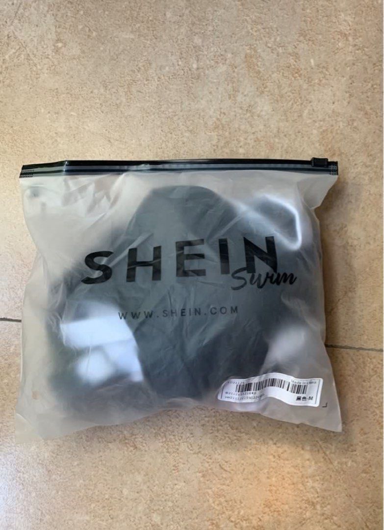 Shein Black one piece swimsuit (Category: Bikinis & Swimsuits) located in Las Pinas. Submitted by jhemmm__ (Listing ID 1371363753, Image 3). Description: Fixed Price! Info: • bought it for ₱248 • Selling it for ₱240 • Never been used for swimming, just tried it with my clothes on to know if it fits but its too loose on me • it has a dirt on the white lining maybe because of accidentally stepping on it while trying it on • Size: Medium Payment Met