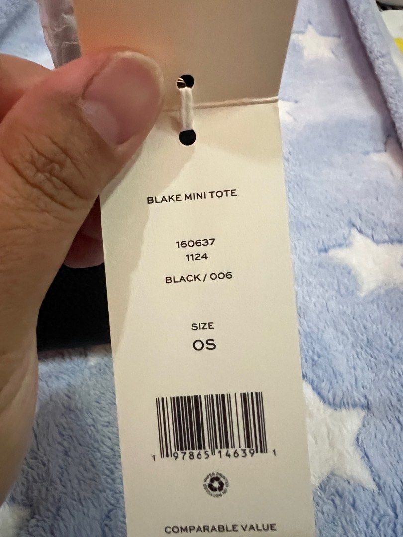 Tory Burch Black Mini Tote - Black (Category: Luxury Bags & Wallets) located in San Pedro. Submitted by misslumi (Listing ID 1371390075, Image 2). Description: Brand New from US Outlet store!!! Fits 13" pro max. Has enough space for card wallet. Actual photo posted..