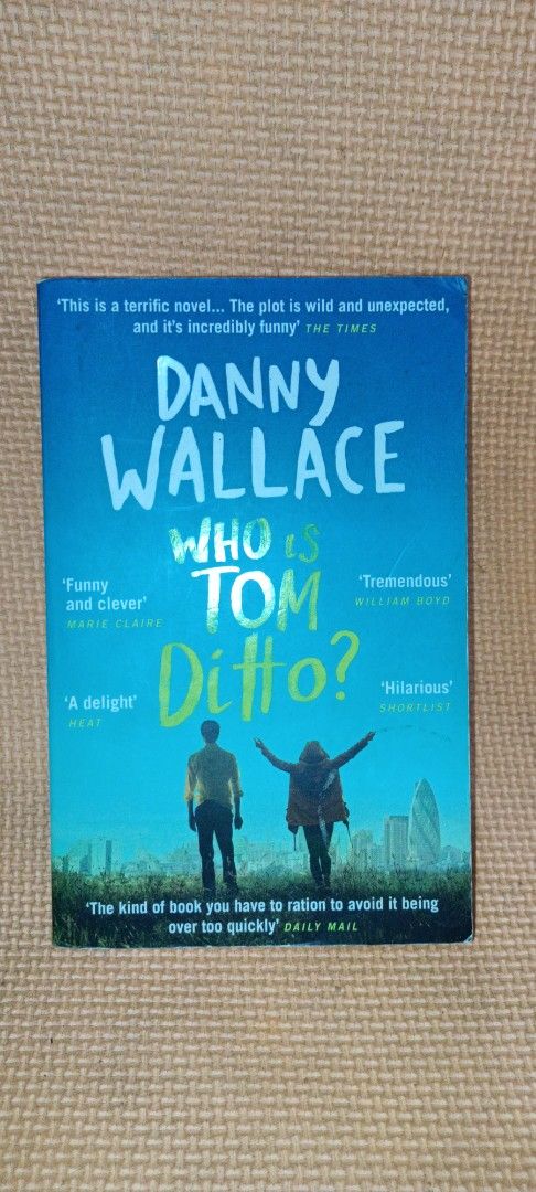 Who is Tom Ditto? (Category: Storybooks) located in Makati City. Submitted by newchaptersnook (Listing ID 1371371851, Image 1). Description: 🌞 Who is Tom Ditto? 🔸Danny Wallace 📚Genre: Mystery Fiction/Contemporary Comedy 🏆 Goodreads Rating: 3.71 🏷️₱180 ***We join the action just as our ‘hero’ Tom, (early thirties, reads the ‘news’ on the radio) finds out that his girlfriend has NOT left him. Tom, I have not left you. But I am gone. Please car
