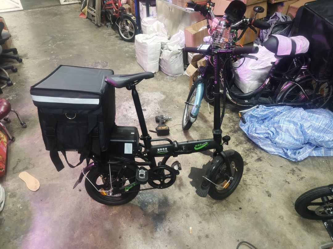 1 And ONLY Brand New Electric bicycle/E-bike with swing arm and suspension LTA Approved Orange Tag 48v 10.4ah (Category: E-Scooters & E-Bikes) located in Singapore. Submitted by salesgreenenergytech (Listing ID 1371637509, Image 8). Description: Brand new LTA approve Orange Tag E-bike Swing arm with reinforced body 48v 10.4ah approve with EN 15194 LTA Approved battery 48v 2a LTA Approved charger with safety mark Roughly around 5-6hrs of charge ti