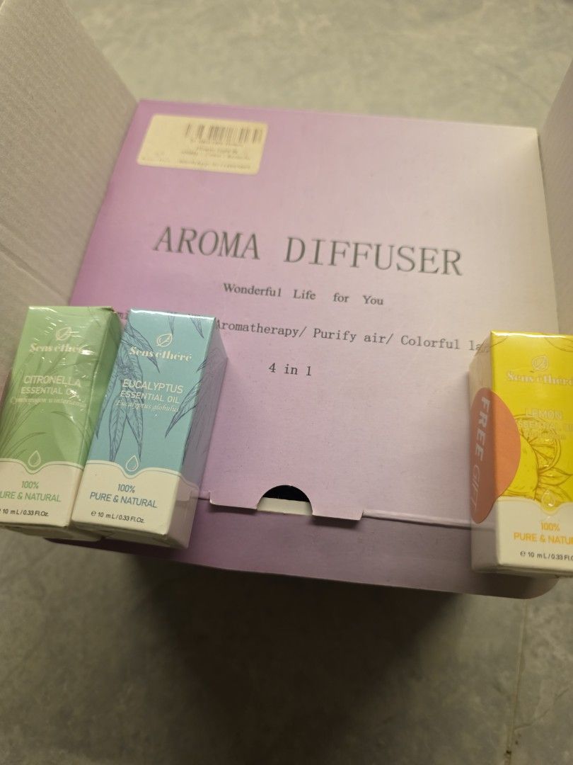 Aromatherapy diffuser (Category: Home Fragrance) located in Petaling Jaya. Submitted by nadnab (Listing ID 1371708316, Image 3). Description: a brand new diffuser has lights too! FREE: 3 NEW aromatherapy essential oil bottles.