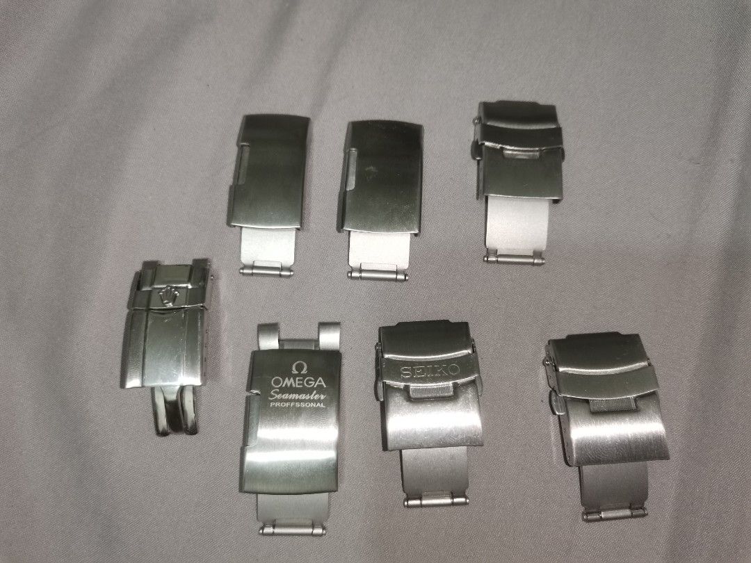 ❗AS IS: TAKE ALL ❗ Assorted Watch Clasp (Category: Men's Watches) located in Cebu City. Submitted by steffiewonder13 (Listing ID 1371637502, Image 2). Description: TAKE ALL AS IS Assorted Sizes 16mm 18mm 20mm Shipping via J&T Express. Payment via Gcash or BDO/BPI fund transfer..