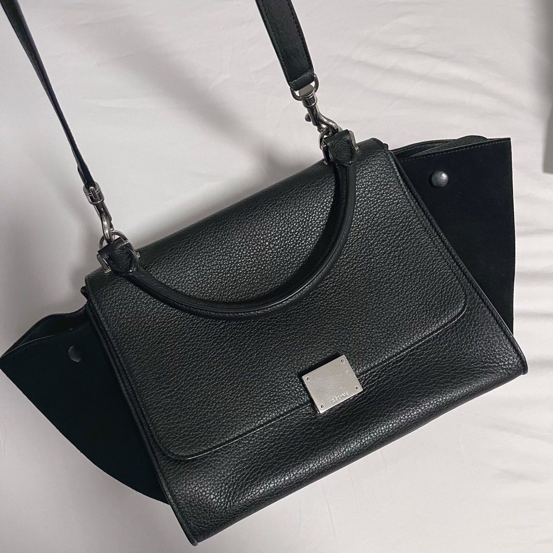 Celine Trapeze Small (Category: Luxury Bags & Wallets) located in Makati City. Submitted by the_ambitious_peasant (Listing ID 1369140600, Image 2). Description: Celine Trapeze Small Black on black Comes with care cards and dust bag.