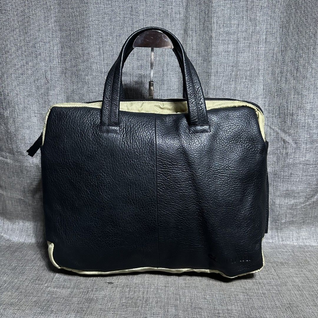 Cerruti 1881 document bag (Category: Luxury Bags & Wallets) located in Manila. Submitted by greyinfash06839 (Listing ID 1371704505, Image 1). Description: 🤍Item: Cerruti 1881 document bag 🤍Brand: Cerruti 1881 🤍Matirial: Leather 🤍Quality: Original 🤍color: Black 🤍Size: Large 🤍Dimension. H: 13 L: 16 W: 4 🤍Sex: For Men 🤍Issue: Sign of use 🤍Condition Rate: 9/10 🤍Other info:.