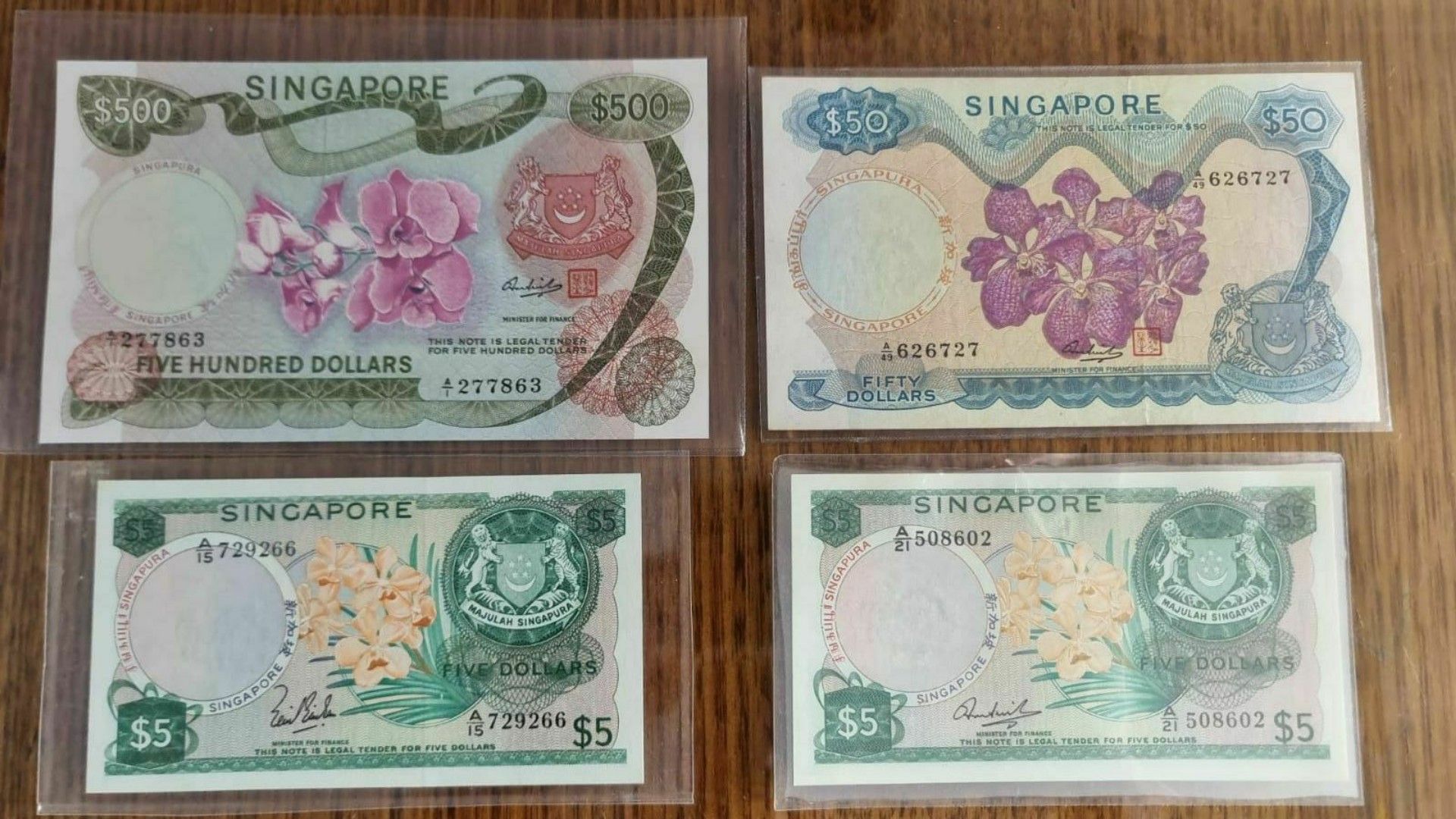 Collection notes (Category: Currency) located in Singapore. Submitted by silvermountain_2fc48a (Listing ID 1371678575, Image 1). Description: 1pc $500 1pc $50 2pcs $5 all 4pcs going for $1388.