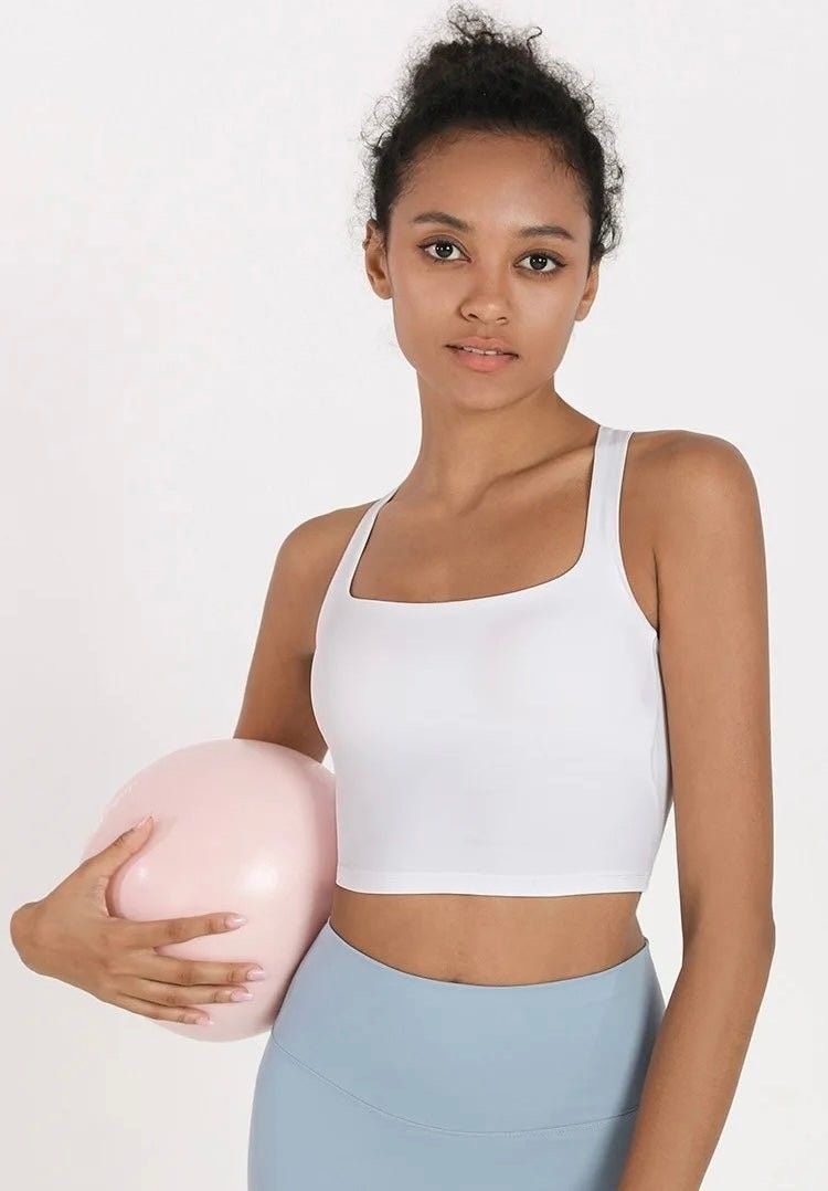 Cross Back Dance Top - White (Category: Activewear) located in Manila. Submitted by teeforel (Listing ID 1371571210, Image 3). Description: Bought the wrong size. The size is L but fits Medium frames. Never used. https://thecollectivedancewear.com/products/cross-back-dance-top-white This top!! It has the coolest back with thick straps in crossed pattern. It is super supportive with it's built in bra shelf so even if you have a larger bust you do 