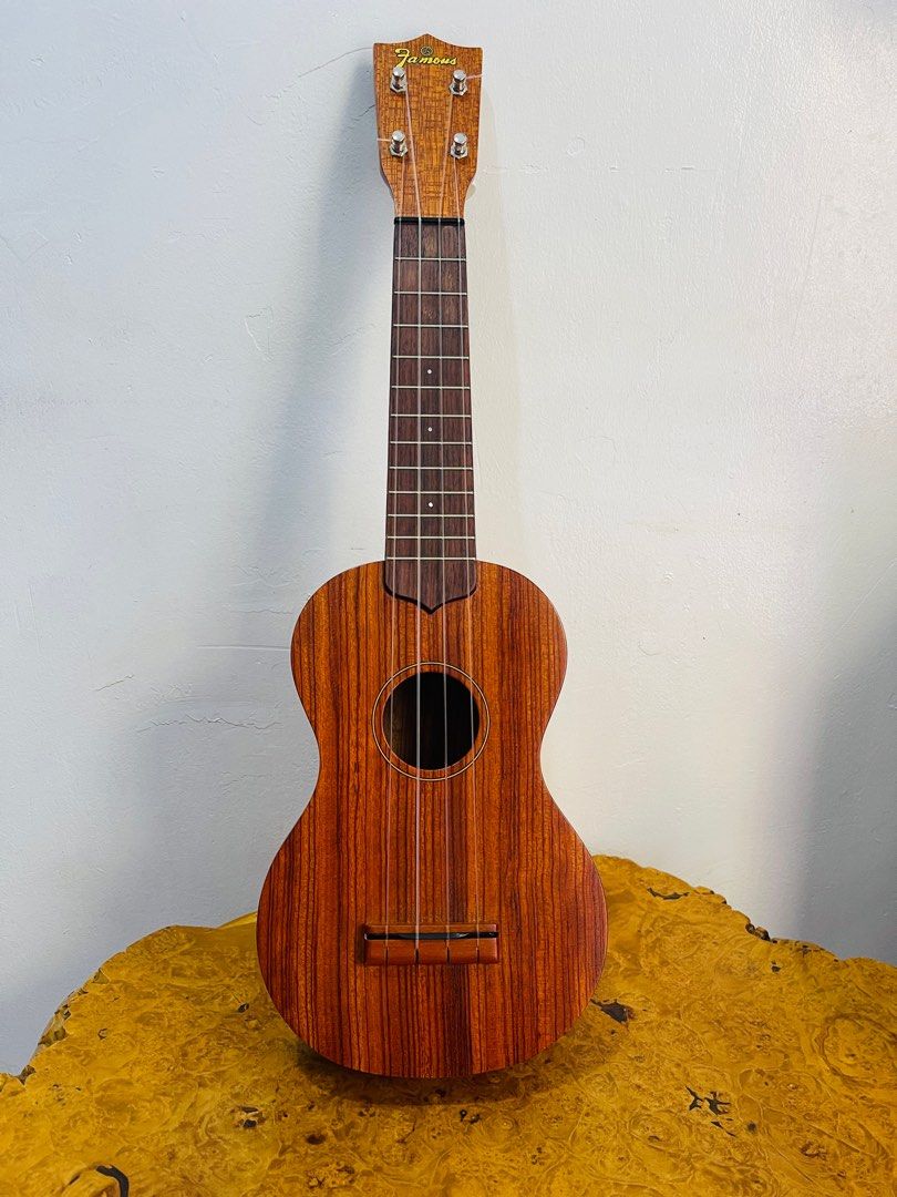 FAMOUS Ukulele Braun (Category: Musical Instruments) located in Manila. Submitted by jdrukjapansurplus (Listing ID 1371614343, Image 1). Description: FAMOUS Ukulele Braun -The #1 popular model of the “Famous Brand” Japanese standard ukulele manufactured since 1955 It has been loved by players of a wide range of players, from the first to the one that has been used for a long time •The FS-5G features a bright, sparkling tone of the Hawaiian core •