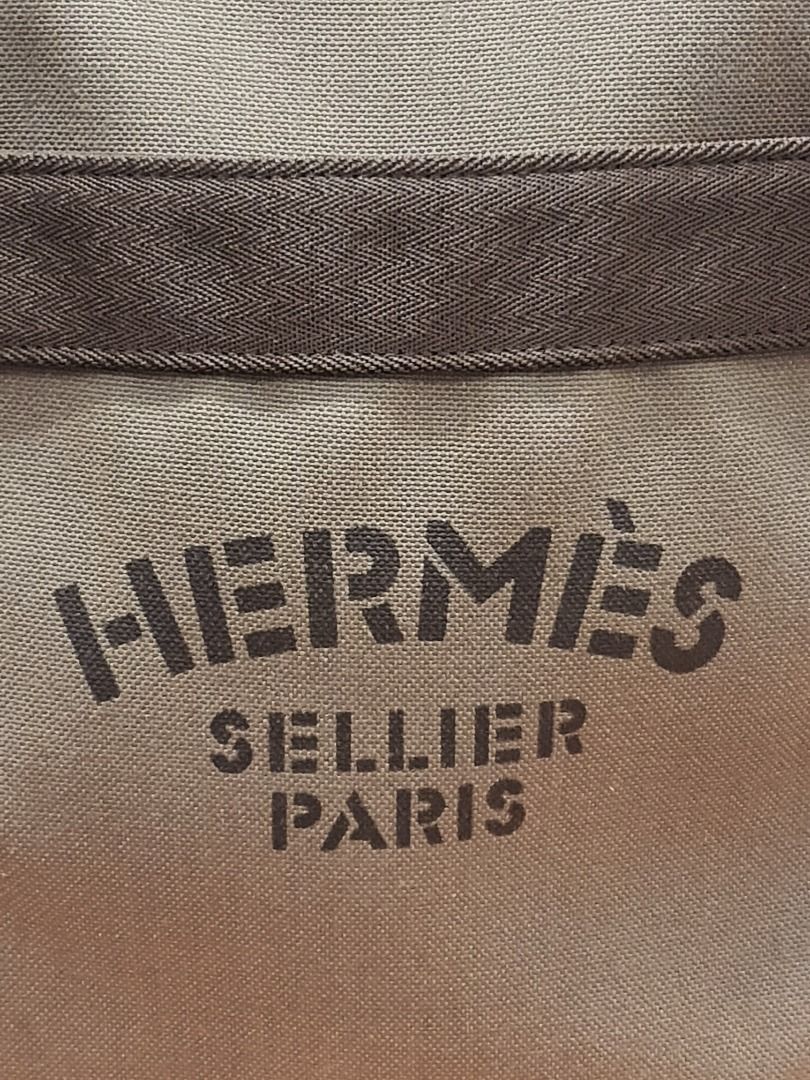 Hermes Grooming Bag Sac de Pansage (Category: Luxury Bags & Wallets) located in Las Pinas. Submitted by therealmacynn (Listing ID 1371591051, Image 3). Description: Hermes Sac de Pansage grooming bag. Body is olive green water-repelling coated canvas. Palladium hardware. There are 3 external pockets and three internal pockets, one with a zipper opening. Includes removable inner cover, removable shoulder strap, dust bag and box. The posted price i