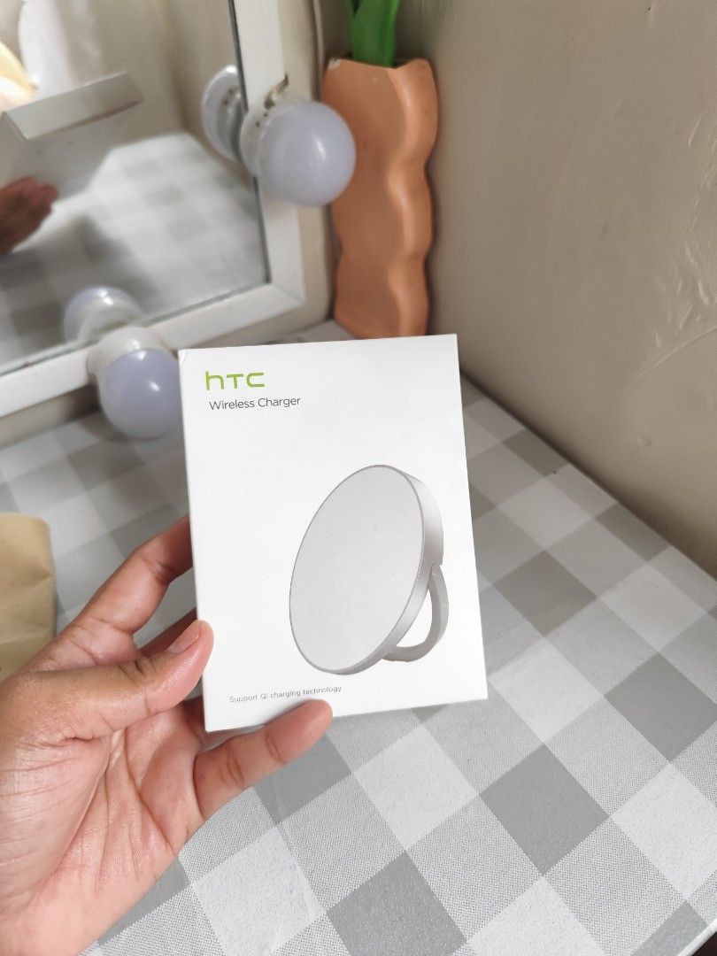HTC Wireless charger high quality (Category: Chargers & Cables) located in Cavite. Submitted by jane_ava (Listing ID 1371559812, Image 2). Description: reg price: 1,199 HTC Wireless Charger 100% Genuine / Brand New / Sealed features: - Output: Up to 15W - Port: USB Type-C - Standard: Qi Compatible - Diameter: 57mm - Thickness: 7mm - Short-circuit protection - Overcurrent Protection - Overvoltage protection What's in the box: 1 x HTC Wireless Char