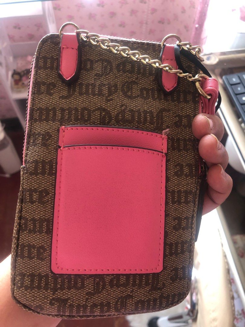 Juicy couture cellphone bag (Category: Wallets & Card holders) located in Las Pinas. Submitted by juuzzmeeh2021 (Listing ID 1371667694, Image 2). Description: The bag itself is okay naman walang scratches or bakbak. Meron lsng konti na bakbak sa parteng strap which is very small naman. Manage your expectation this is a preloved but well loves bag. NO TO COD. Payment first.