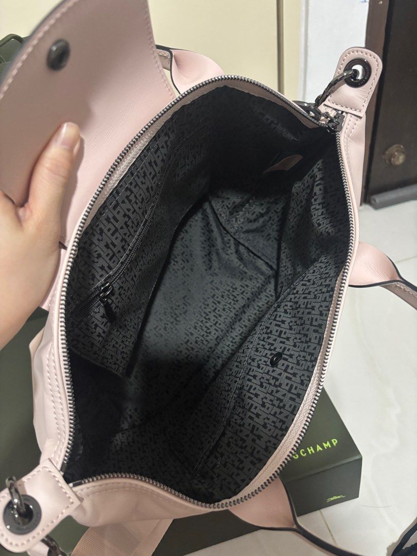 Longchamp LE PLIAGE XTRA S Handbag - Leather (Category: Bags & Wallets) located in Singapore. Submitted by xxuan58 (Listing ID 1371652213, Image 3). Description: Dimensions : 25 cm (L - measured at the base of the bag) x 23 cm (H) x 16 cm (W) Nude colour - Leather Snap button Zip closure Detachable and adjustable shoulder strap 1 zipped pocket and 1 flat pocket inside.