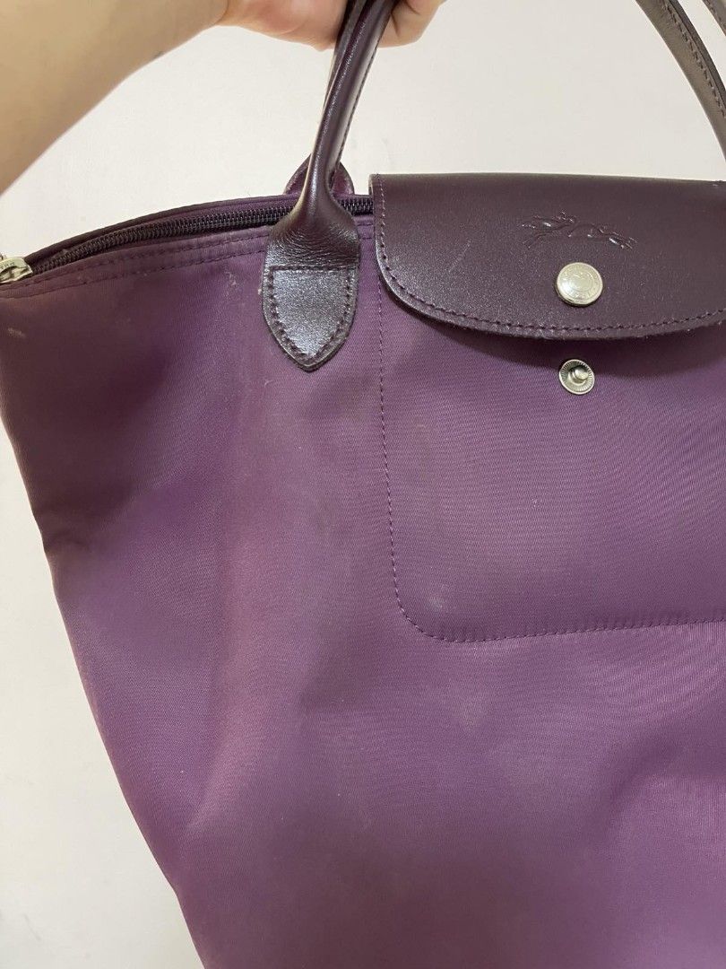 Longchamp Small Short Handle (Category: Luxury Bags & Wallets) located in Manila. Submitted by maryannlaman (Listing ID 1371602450, Image 3). Description: - authentic - with care card - needs intense cleaning - flaw: oil stains from food - inside is okay - bought in Rustan's MOP: Gcash or BDO Shipping: Lalamove, grab express or LBC only.