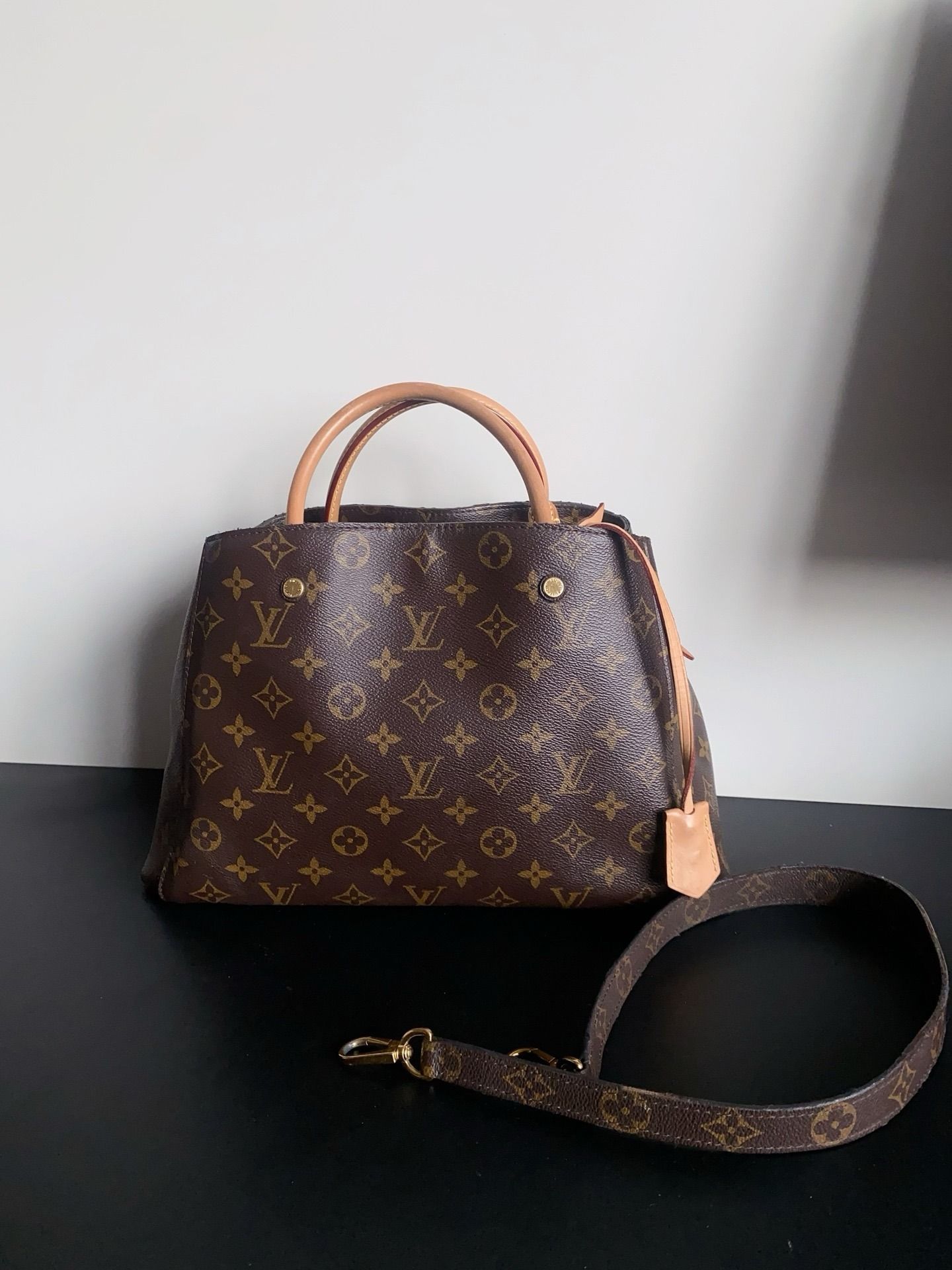Louis Vuitton Montaigne MM in Monogram (Category: Bags & Wallets) located in Singapore. Submitted by projectlfg (Listing ID 1371649279, Image 2). Description: Louis Vuitton Montaigne MM in Monogram Condition 97% New. Accessories: Lock, key, shoulder strap Size: 35x22 / SGD: 1263 / 1354980 • ACRA Registered Company in Singapore • Physical Outlets in Singapore and China • Entrupy Verified Business • Authenticity Guaranteed • Worldwide Shipping We e