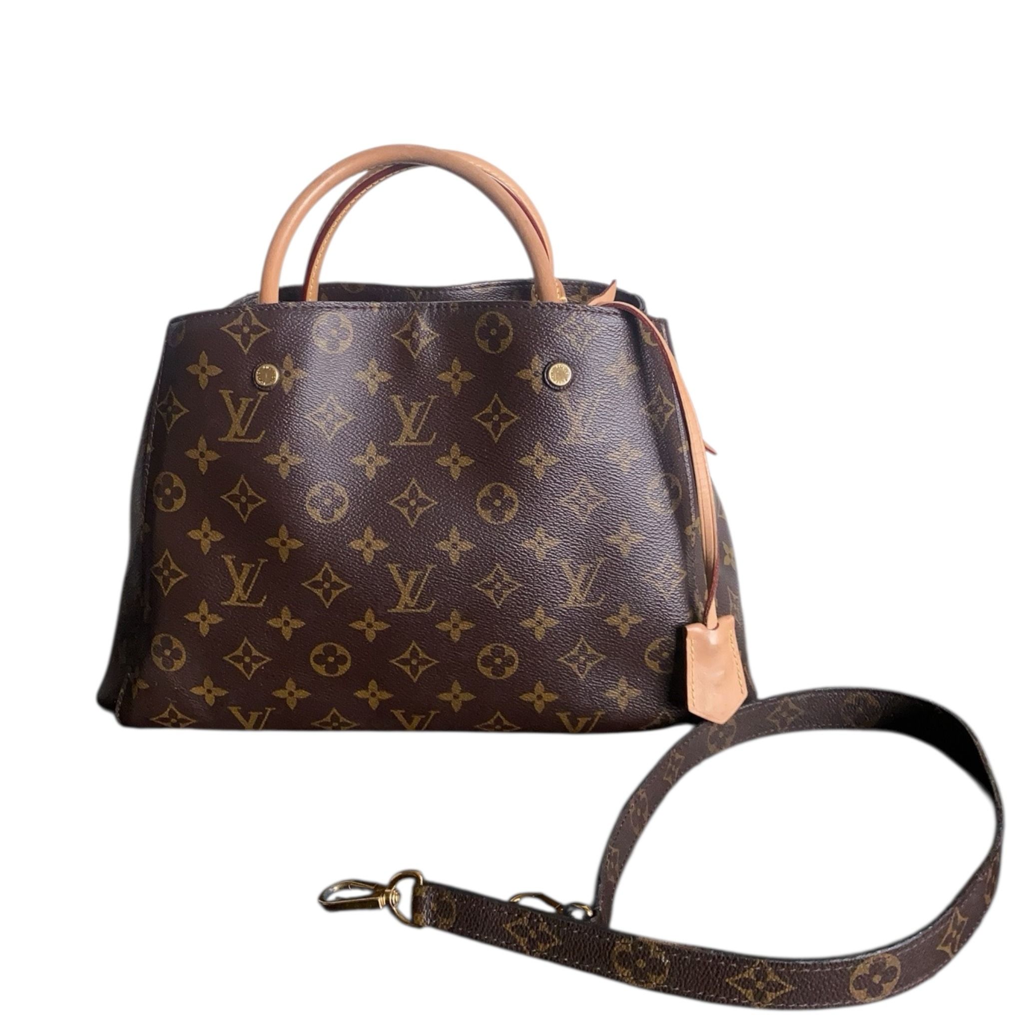Louis Vuitton Montaigne MM in Monogram (Category: Bags & Wallets) located in Singapore. Submitted by projectlfg (Listing ID 1371649279, Image 1). Description: Louis Vuitton Montaigne MM in Monogram Condition 97% New. Accessories: Lock, key, shoulder strap Size: 35x22 / SGD: 1263 / 1354980 • ACRA Registered Company in Singapore • Physical Outlets in Singapore and China • Entrupy Verified Business • Authenticity Guaranteed • Worldwide Shipping We e