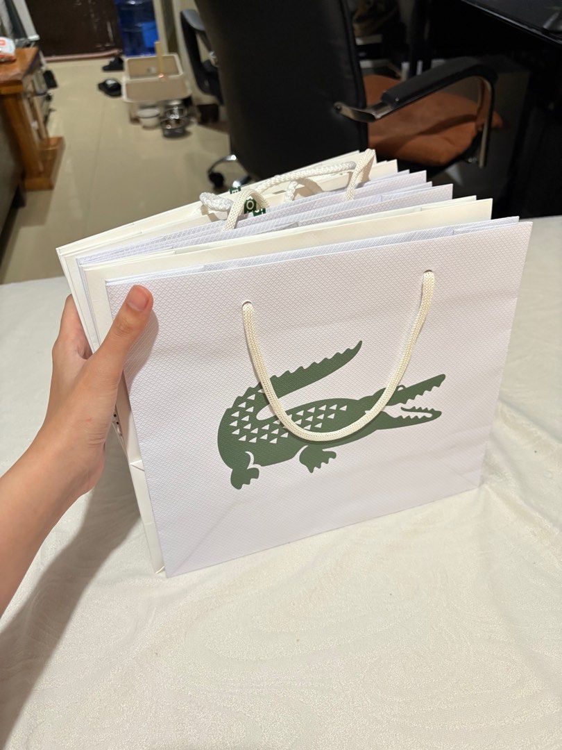 Original Lacoste Paper Bag (6pcs) (Category: Tote Bags) located in Cainta. Submitted by trishiaa21 (Listing ID 1371598714, Image 2). Description: Take all for 600 6pcs Brandnew condition Rfs: decluttering Small size .