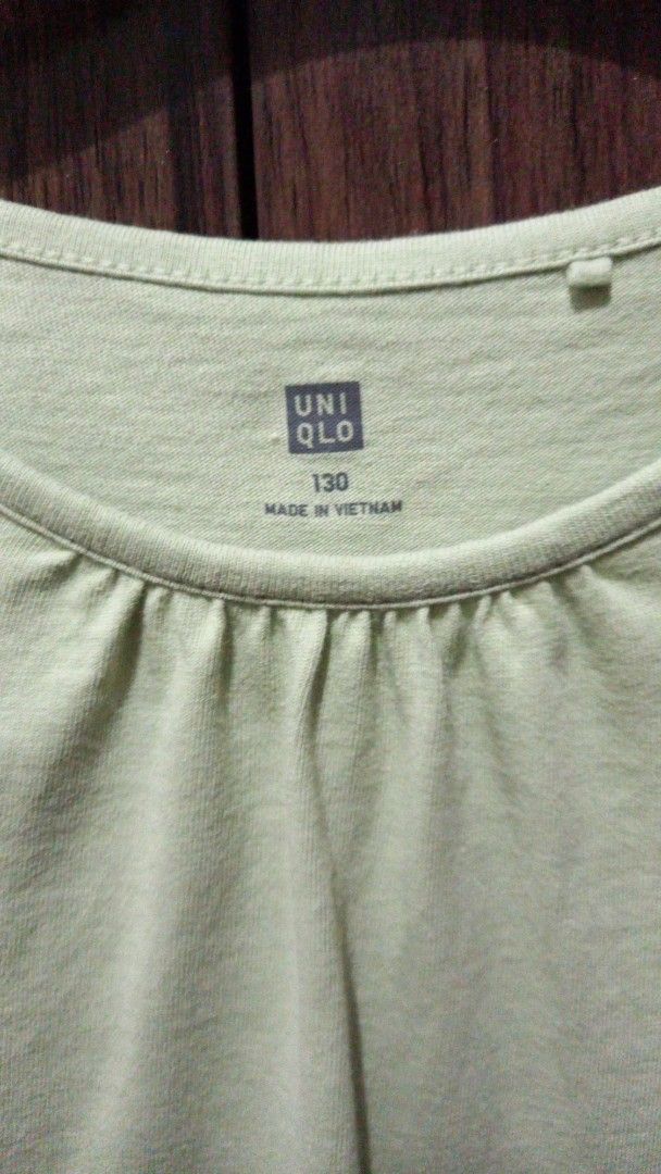 Preloved Uniqlo Kid's shirt (Category: Babies & Kids Fashion) located in Caloocan City. Submitted by httyt.45 (Listing ID 1371727821, Image 3). Description: Cotton fabric size 140 light green color.