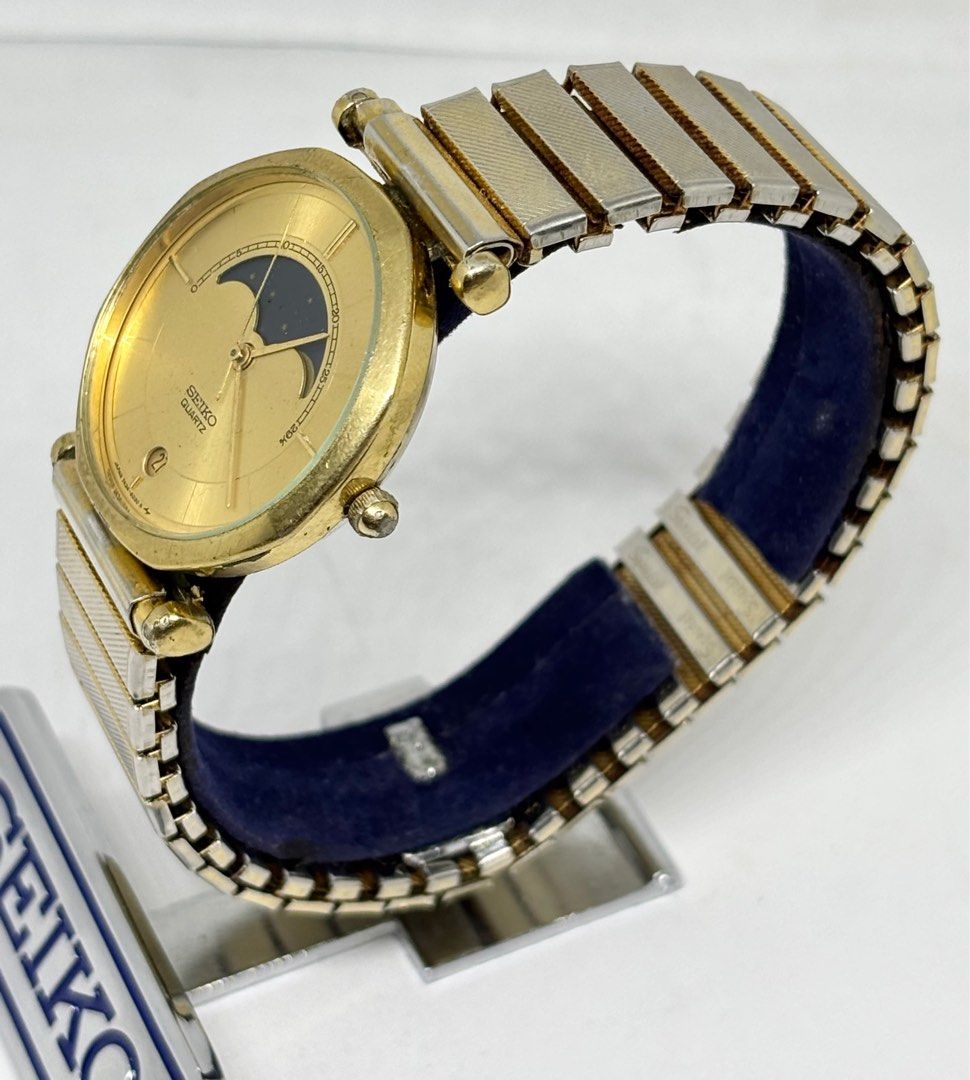 Seiko Moonphase 7434 Gold Filled Watch (Category: Luxury Watches) located in Subic. Submitted by modern.vintage.enthusiast (Listing ID 1371709533, Image 2). Description: •Seiko moonphase watch •All original watch head •Ref 7434 6020 •Quartz movement working well newly service •Sunburst gold color dial •33mm case diameter •19mm lug size •Bmby 1985 November Please see photos for best description Feel free to DM for more details of the watch Thanks 