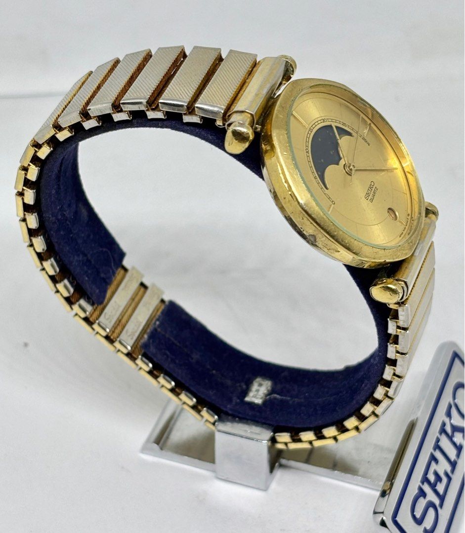 Seiko Moonphase 7434 Gold Filled Watch (Category: Luxury Watches) located in Subic. Submitted by modern.vintage.enthusiast (Listing ID 1371709533, Image 3). Description: •Seiko moonphase watch •All original watch head •Ref 7434 6020 •Quartz movement working well newly service •Sunburst gold color dial •33mm case diameter •19mm lug size •Bmby 1985 November Please see photos for best description Feel free to DM for more details of the watch Thanks 