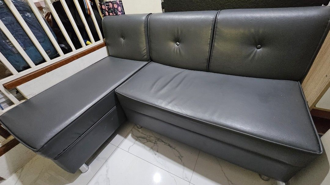 Sofa Gray Leather (3 seater) from Mandaue Foam (Category: Sofas) located in Paranaque City. Submitted by n30h29 (Listing ID 1371560332, Image 3). Description: Sofa Gray Leather (2pc) from Mandaue Foam Orig Price 16k Minor peeling of leather edge shown on last picture due to normal wear and tear but foam and everything still intact and firm. Used only for 2+ years.