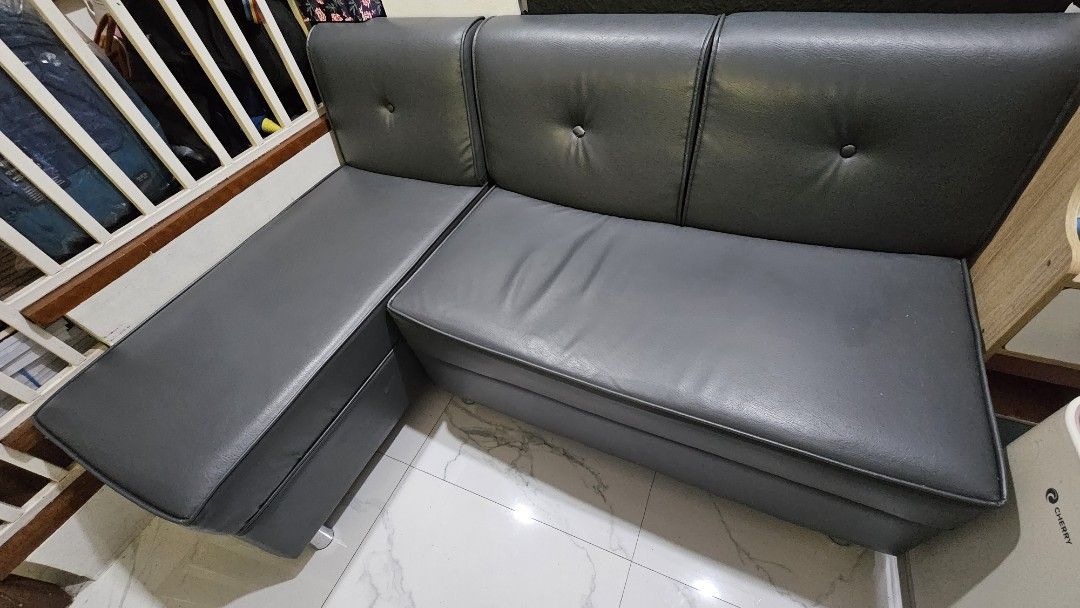 Sofa Gray Leather (3 seater) from Mandaue Foam (Category: Sofas) located in Paranaque City. Submitted by n30h29 (Listing ID 1371560332, Image 2). Description: Sofa Gray Leather (2pc) from Mandaue Foam Orig Price 16k Minor peeling of leather edge shown on last picture due to normal wear and tear but foam and everything still intact and firm. Used only for 2+ years.