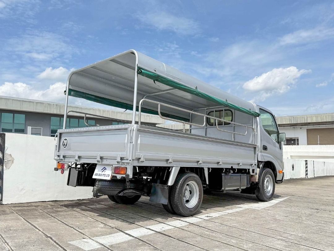 Toyota Dyna 150 (Category: Used Commercial Vehicles for Sale) located in Singapore. Submitted by absbus (Listing ID 1371625048, Image 3). Description: Call to secure this unit now! tel:88512735 Jeff Joo 🚛 2015 Toyota Dyna 150 - 5MT 🚛 🔥 1 Owner | Comes with Canopy & Full Chequered Plate 🔥🔥 💰 Price: $49,988 ONLY 💸 Monthly From: ONLY $9XX/month 🔧 Key Features: ✔️ 3.0L Turbo Diesel Engine — Power + Efficiency ✔️ Manual Transmission — Total Co