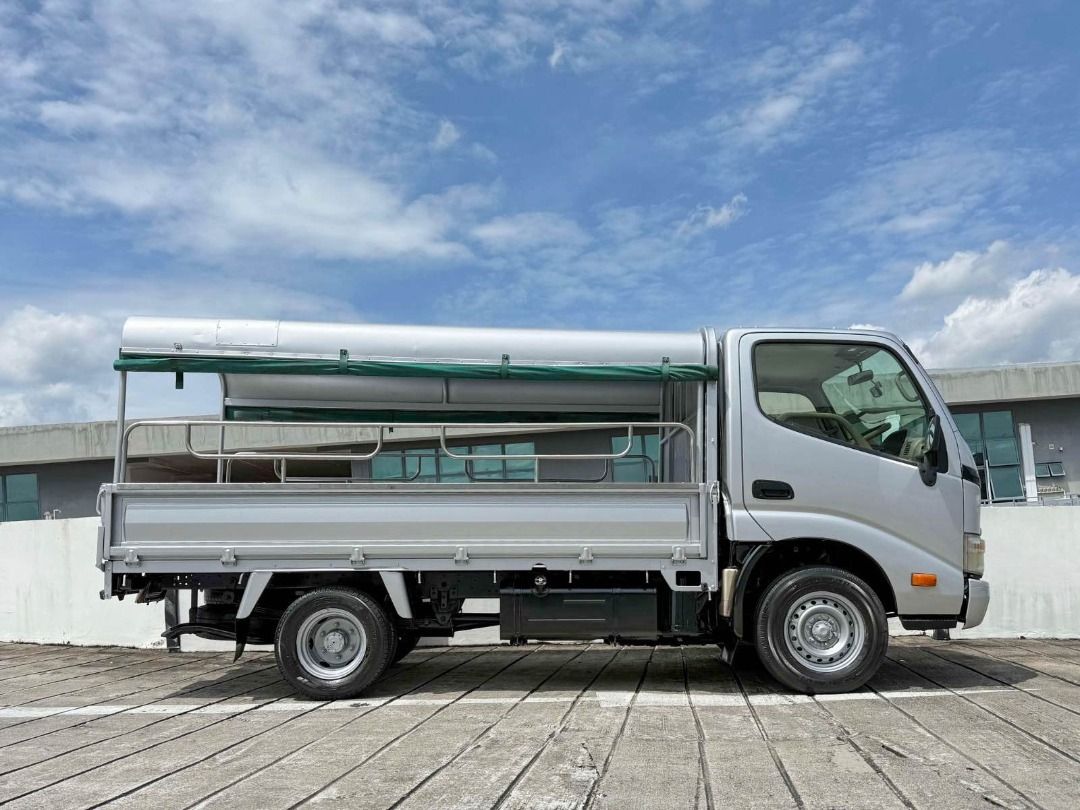 Toyota Dyna 150 (Category: Used Commercial Vehicles for Sale) located in Singapore. Submitted by absbus (Listing ID 1371625048, Image 2). Description: Call to secure this unit now! tel:88512735 Jeff Joo 🚛 2015 Toyota Dyna 150 - 5MT 🚛 🔥 1 Owner | Comes with Canopy & Full Chequered Plate 🔥🔥 💰 Price: $49,988 ONLY 💸 Monthly From: ONLY $9XX/month 🔧 Key Features: ✔️ 3.0L Turbo Diesel Engine — Power + Efficiency ✔️ Manual Transmission — Total Co