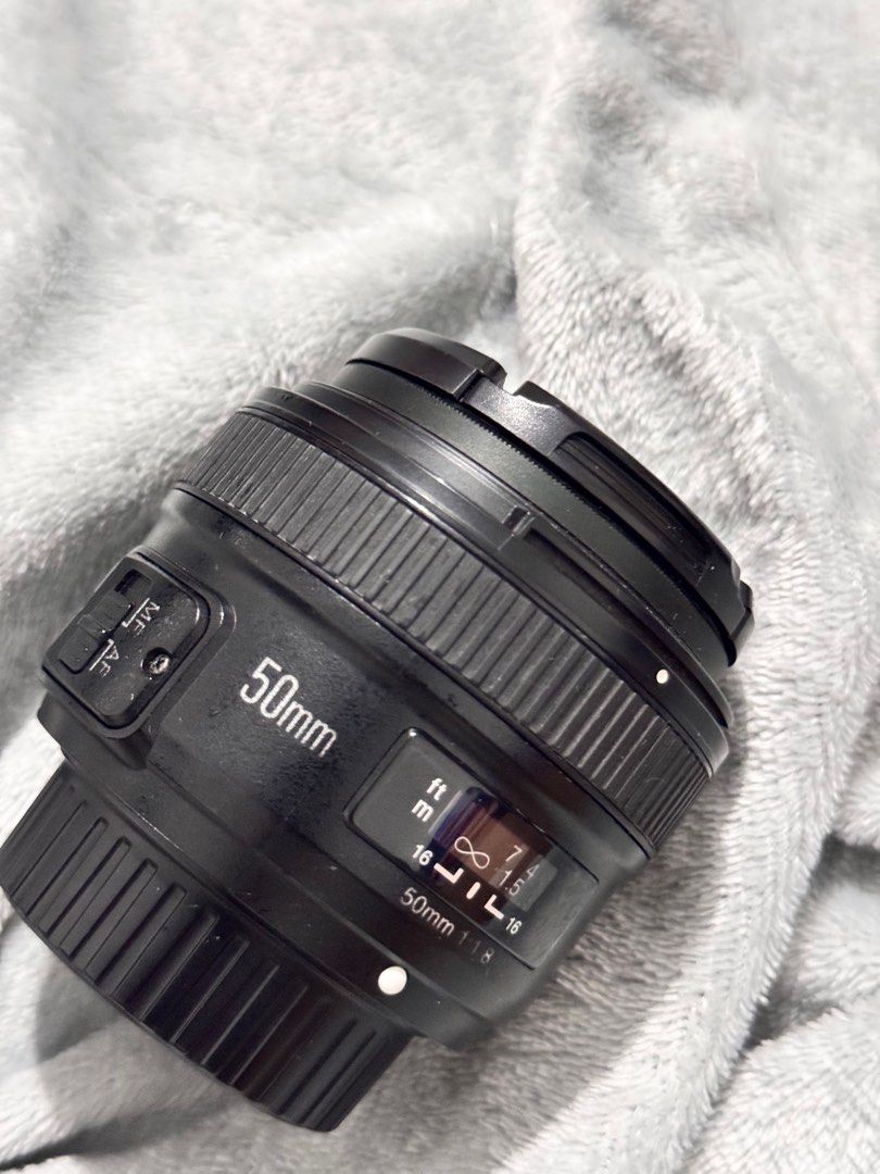 Yongnuo 50mm Lens for Nikon Camera (Category: Lens & Kits) located in Quezon City. Submitted by clothes_co (Listing ID 1371672702, Image 1). Description: Lens only Well used without issues rfs: Switching to Fujifilm mirrorless camera.