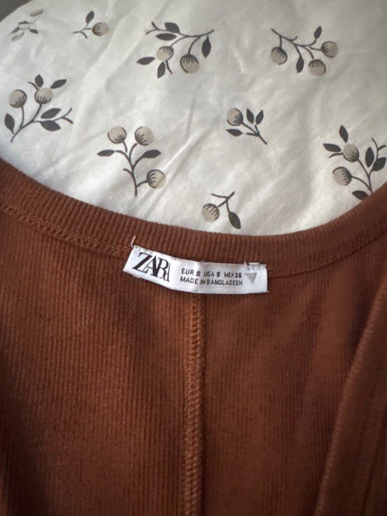 Zara Basic Tanks (Category: Sleeveless) located in Singapore. Submitted by feraluni (Listing ID 1371647050, Image 2). Description: Used once on a trip Bought in Paris Material is super soft and comfy Flattering on your figure too Tagged S, fits XS-M as there is stretch ONLY SELLING AS A SET Price is fixed Take all 3 for $45.