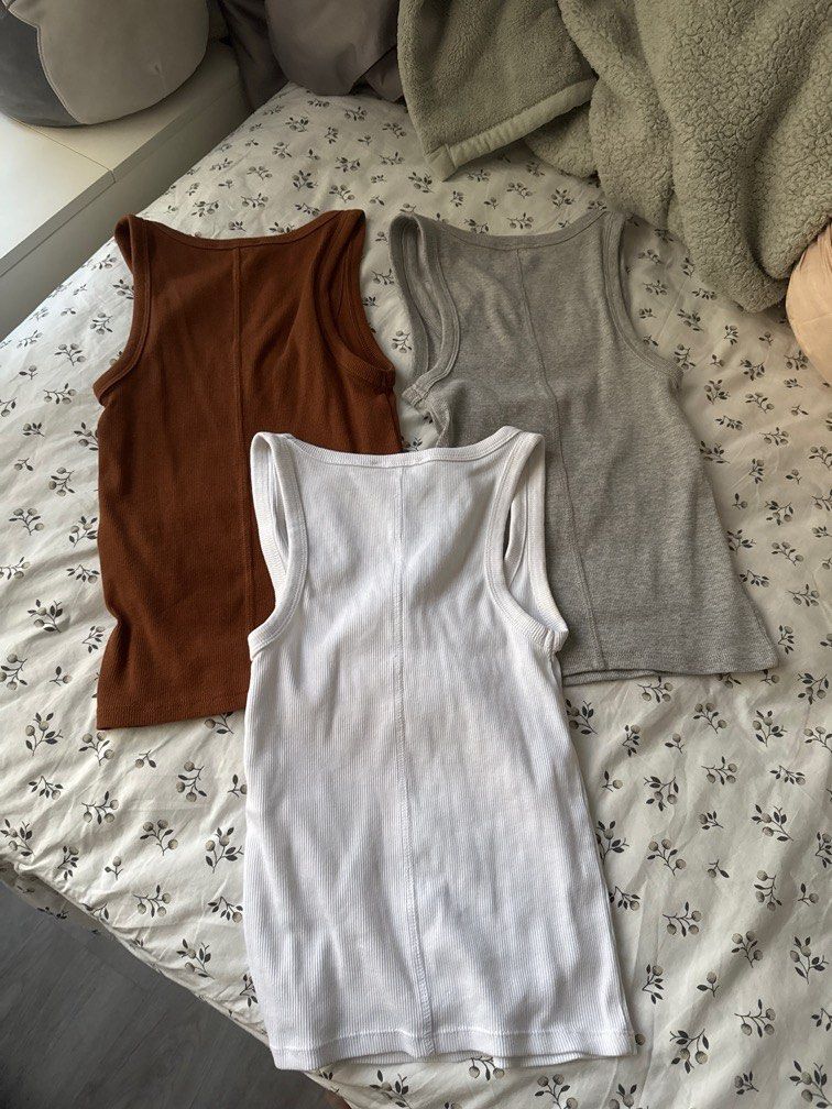 Zara Basic Tanks (Category: Sleeveless) located in Singapore. Submitted by feraluni (Listing ID 1371647050, Image 5). Description: Used once on a trip Bought in Paris Material is super soft and comfy Flattering on your figure too Tagged S, fits XS-M as there is stretch ONLY SELLING AS A SET Price is fixed Take all 3 for $45.
