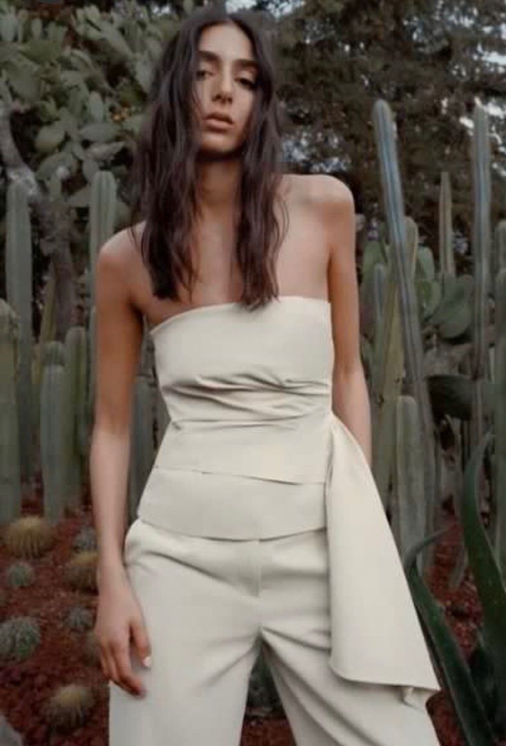 Zara Beige Bustier Tube Top (Category: Others Tops) located in Paete. Submitted by arria.j (Listing ID 1371581238, Image 3). Description: - Zara Cream Beige Bustier Top - Draped fabric on the side - Contrast lining - Invisible side zip fastening (.5 inch cut stitch on the zipper, not visible since sa inner siya) - altered on the back - used only once - bought from store! Original top price: 2995 .